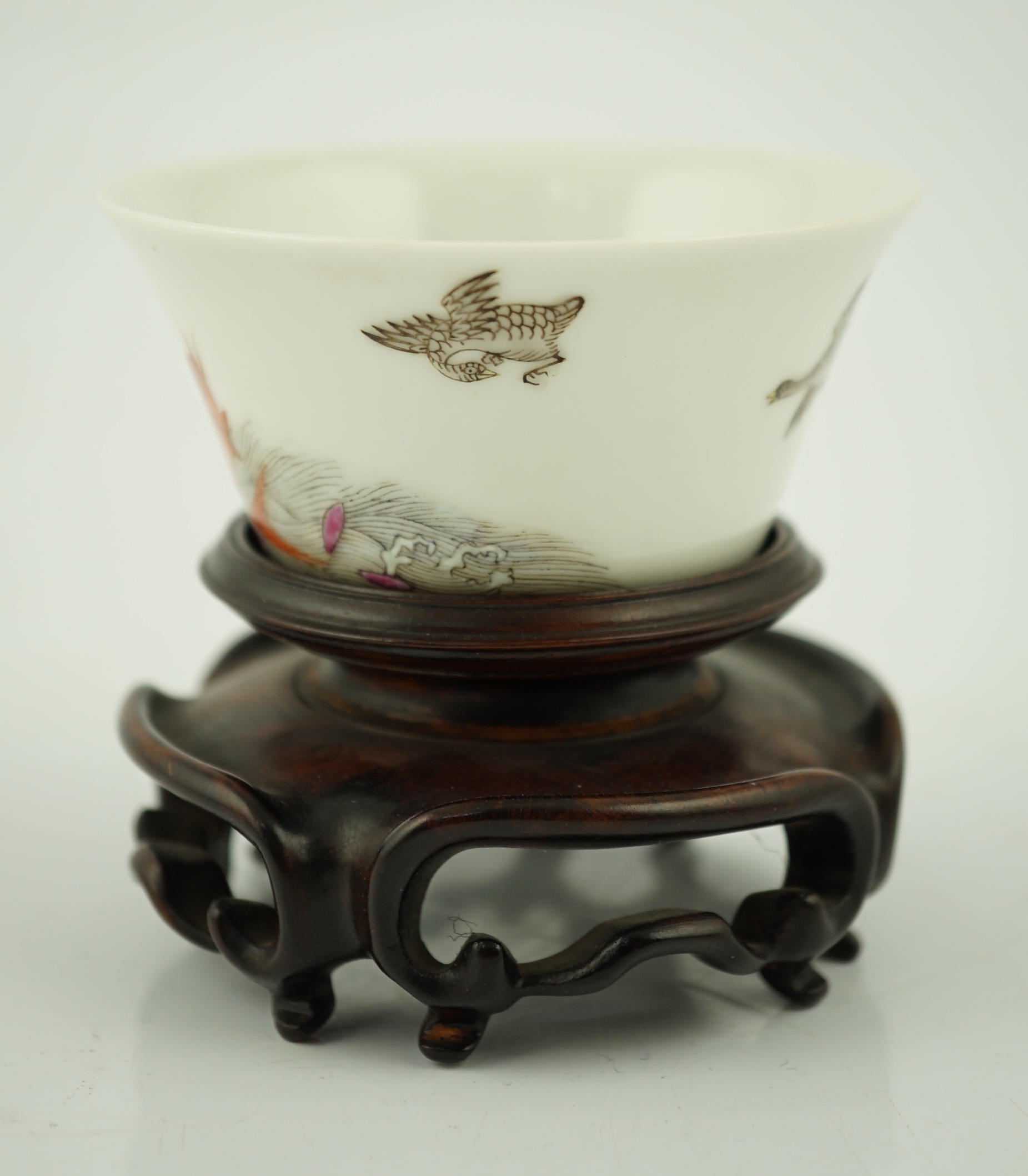 A Chinese enamelled porcelain 'leaping carp' cup, Daoguang mark and possibly of the period